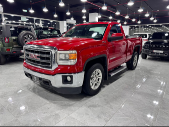 GMC  Sierra  SLE  2015  Automatic  192,000 Km  8 Cylinder  Four Wheel Drive (4WD)  Pick Up  Red