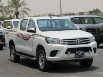 Toyota  Hilux  2020  Automatic  31,000 Km  4 Cylinder  Four Wheel Drive (4WD)  Pick Up  White  With Warranty