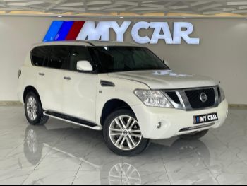 Nissan  Patrol  SE  2013  Automatic  247,000 Km  8 Cylinder  Four Wheel Drive (4WD)  SUV  White