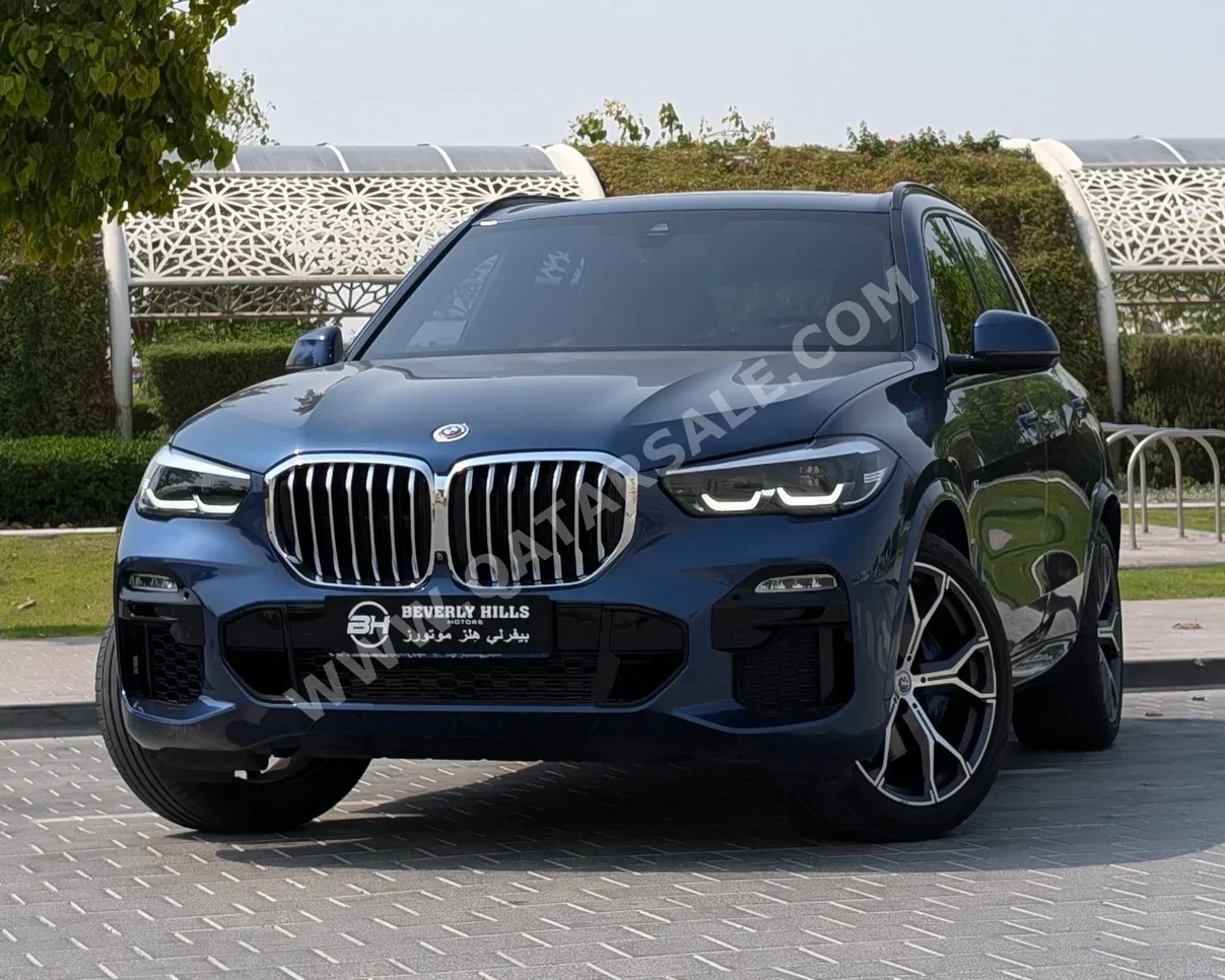 BMW  X-Series  X5 40i  2022  Automatic  39,497 Km  6 Cylinder  All Wheel Drive (AWD)  SUV  Blue  With Warranty