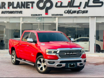 دودج  رام  لاراميي  2021  اوتوماتيك  174,000 كم  8 سلندر  دفع رباعي  بيكب  أحمر