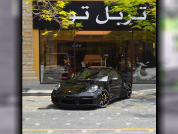 بورش  911  توربو اس  2020  اوتوماتيك  53,250 كم  6 سلندر  دفع خلفي  كوبيه \ سبورت  أسود  تحت الضمان