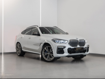 BMW  X-Series  X6 M50i  2021  Automatic  64,000 Km  8 Cylinder  Four Wheel Drive (4WD)  SUV  White