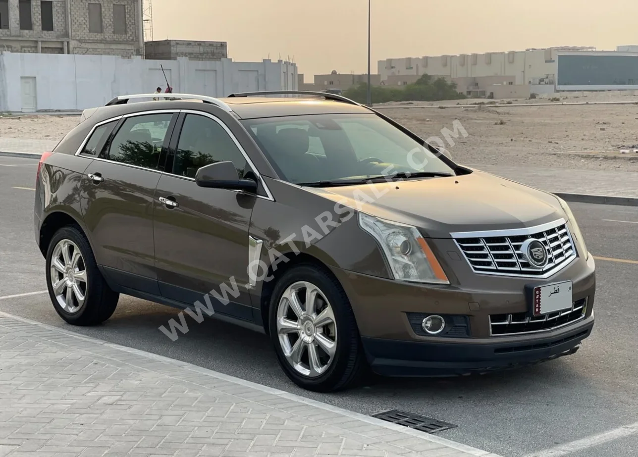 Cadillac  SRX  4  2014  Automatic  76,000 Km  6 Cylinder  All Wheel Drive (AWD)  SUV  Brown