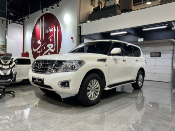 Nissan  Patrol  SE  2014  Automatic  322,000 Km  8 Cylinder  Four Wheel Drive (4WD)  SUV  White