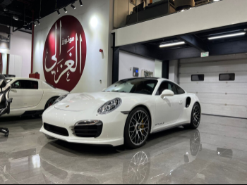 Porsche  911  Turbo S  2014  Automatic  62,000 Km  6 Cylinder  Rear Wheel Drive (RWD)  Coupe / Sport  White
