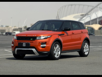 Land Rover  Evoque  Dynamic  2015  Automatic  66,000 Km  4 Cylinder  Four Wheel Drive (4WD)  SUV  Orange