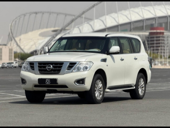 Nissan  Patrol  SE  2013  Automatic  233,000 Km  8 Cylinder  Four Wheel Drive (4WD)  SUV  White