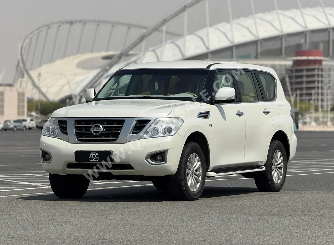 Nissan  Patrol  SE  2013  Automatic  233,000 Km  8 Cylinder  Four Wheel Drive (4WD)  SUV  White