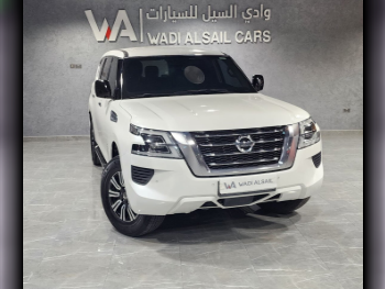 Nissan  Patrol  XE  2020  Automatic  153,000 Km  6 Cylinder  Four Wheel Drive (4WD)  SUV  White