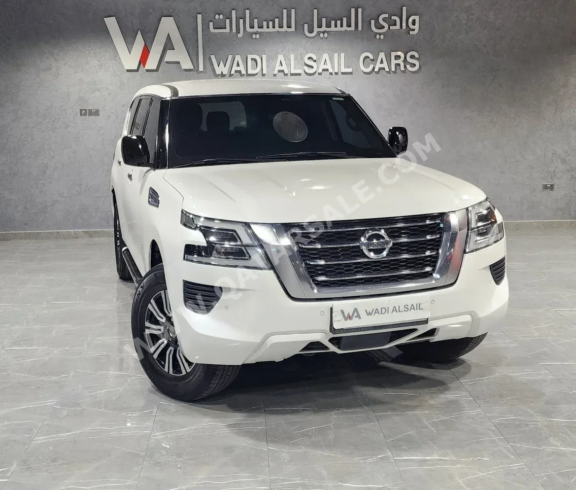 Nissan  Patrol  XE  2020  Automatic  153,000 Km  6 Cylinder  Four Wheel Drive (4WD)  SUV  White