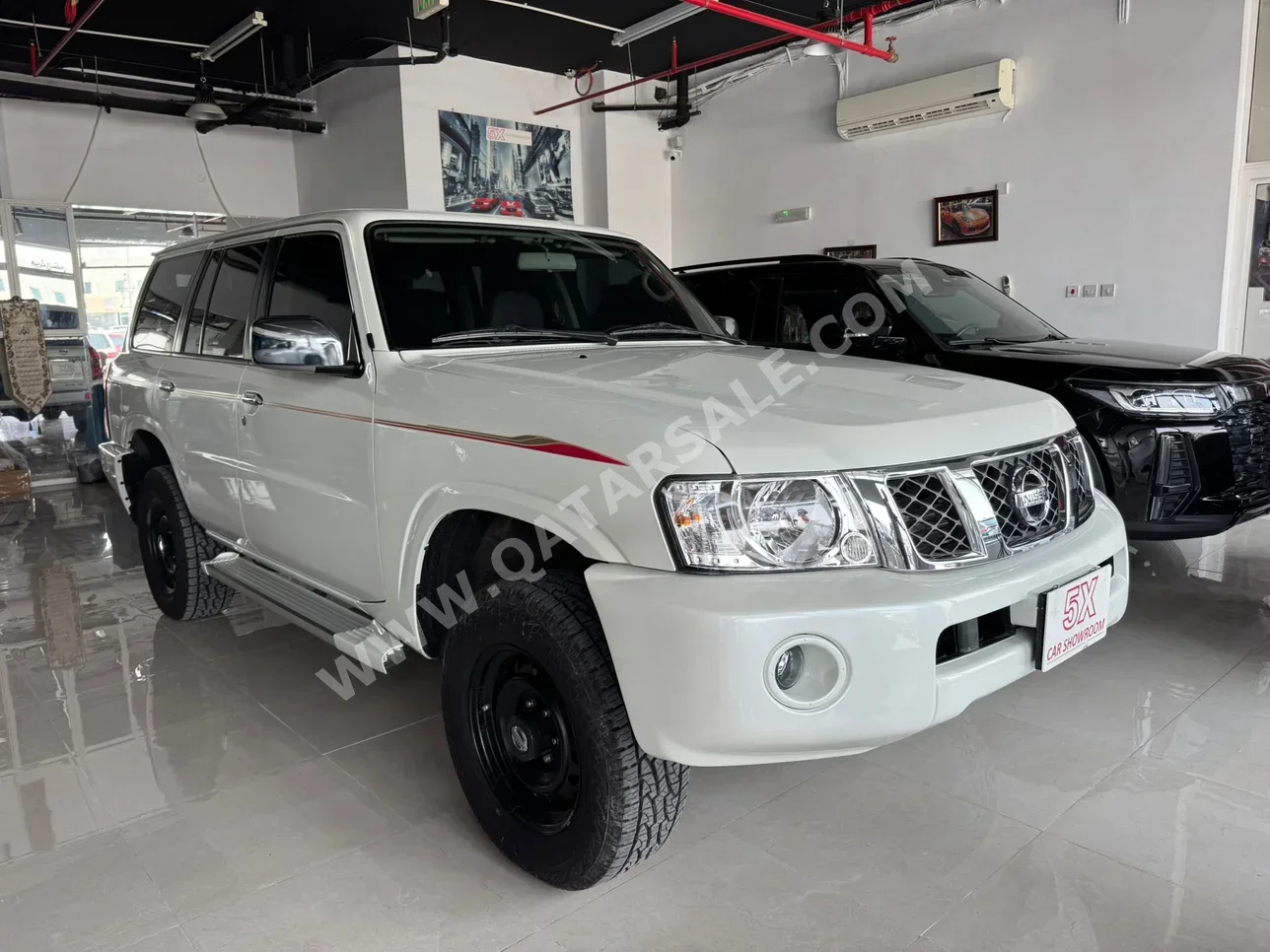 Nissan  Patrol  GL  2023  Automatic  5,000 Km  6 Cylinder  Four Wheel Drive (4WD)  SUV  White  With Warranty