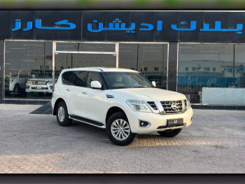 Nissan  Patrol  SE  2017  Automatic  254,000 Km  6 Cylinder  Four Wheel Drive (4WD)  SUV  White