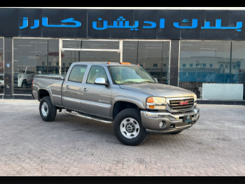 GMC  Sierra  2500 HD  2006  Automatic  231,000 Km  8 Cylinder  Four Wheel Drive (4WD)  Pick Up  Gray