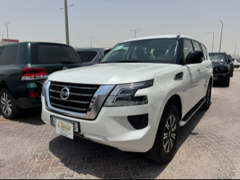 Nissan  Patrol  XE  2021  Automatic  105,000 Km  6 Cylinder  Four Wheel Drive (4WD)  SUV  White
