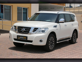Nissan  Patrol  Platinum  2015  Automatic  250,000 Km  8 Cylinder  Four Wheel Drive (4WD)  SUV  White