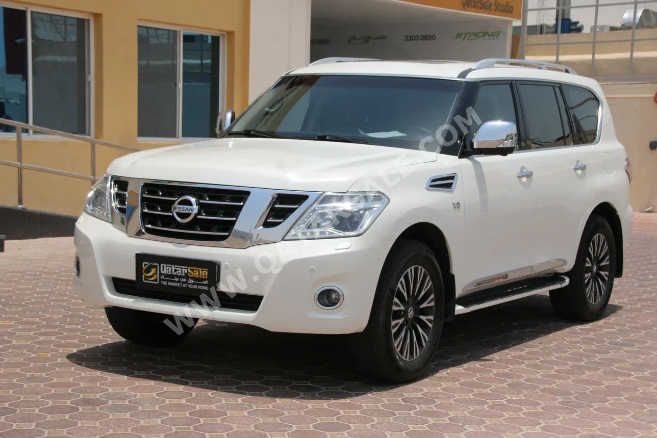 Nissan  Patrol  Platinum  2015  Automatic  250,000 Km  8 Cylinder  Four Wheel Drive (4WD)  SUV  White