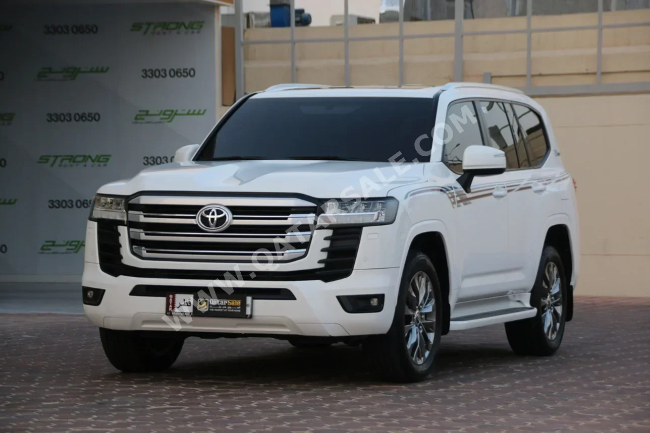 Toyota  Land Cruiser  GXR Twin Turbo  2022  Automatic  64,000 Km  6 Cylinder  Four Wheel Drive (4WD)  SUV  White  With Warranty
