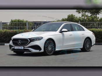 Mercedes-Benz  E-Class  200 AMG  2025  Automatic  15 Km  4 Cylinder  Rear Wheel Drive (RWD)  Sedan  White  With Warranty