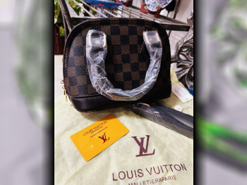 Bags  - Louis Vuitton  - Brown  - Genuine Leather  - For Women