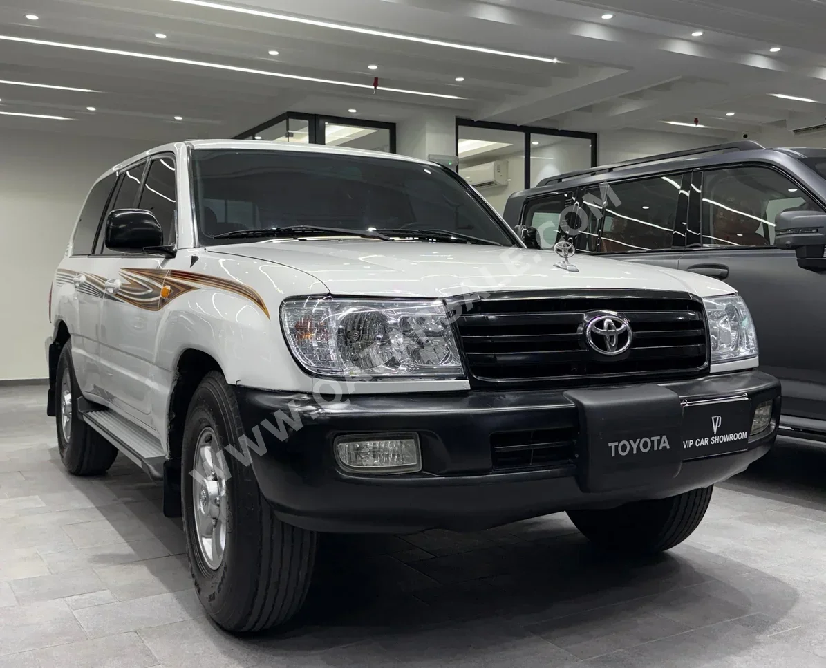 Toyota  Land Cruiser  GX  2004  Manual  427,000 Km  6 Cylinder  Four Wheel Drive (4WD)  SUV  White