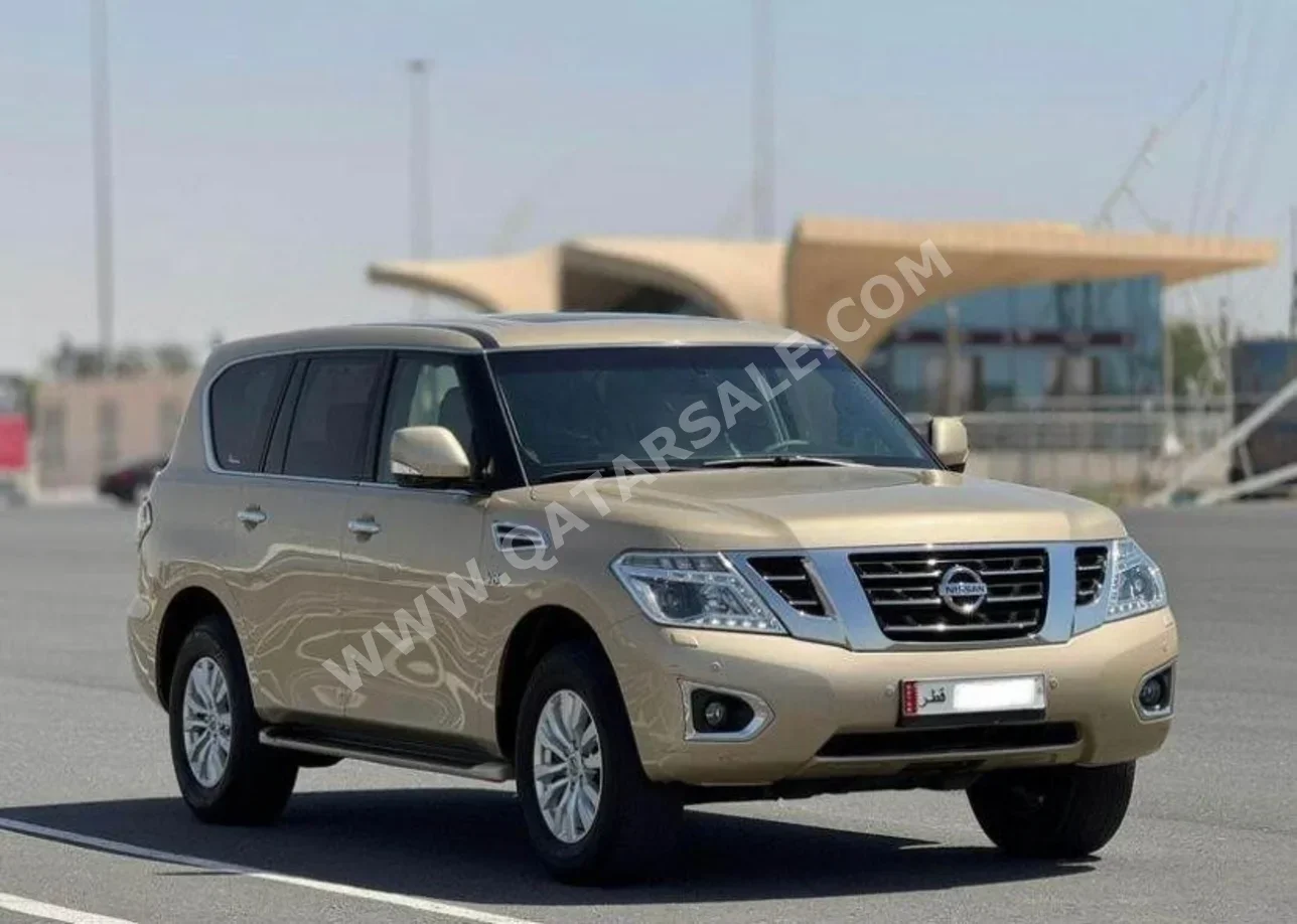 Nissan  Patrol  SE  2015  Automatic  275,000 Km  8 Cylinder  Four Wheel Drive (4WD)  SUV  Gold