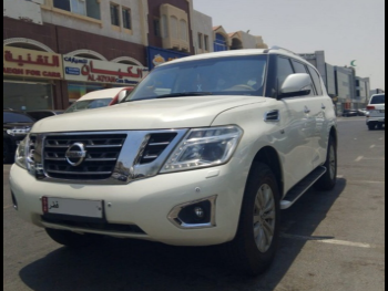 Nissan  Patrol  SE  2014  Automatic  360,000 Km  8 Cylinder  Four Wheel Drive (4WD)  SUV  White