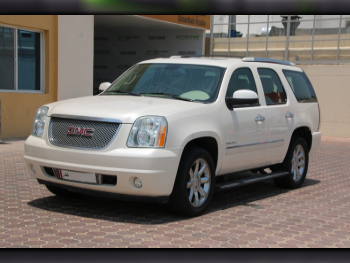 GMC  Yukon  Denali  2012  Automatic  167,000 Km  8 Cylinder  Four Wheel Drive (4WD)  SUV  Pearl