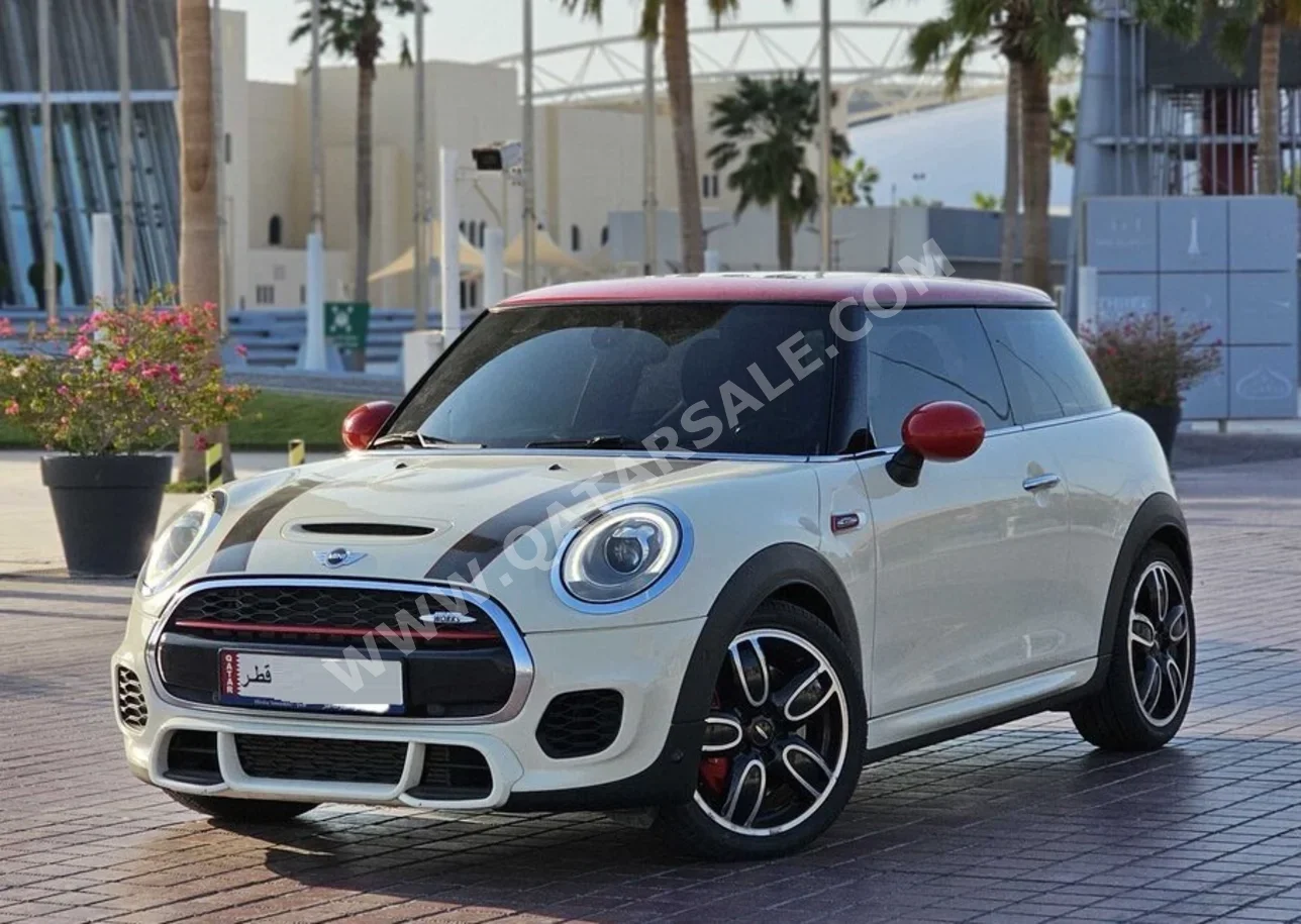 Mini  Cooper  JCW  2018  Automatic  126,500 Km  4 Cylinder  Front Wheel Drive (FWD)  Hatchback  White and Red