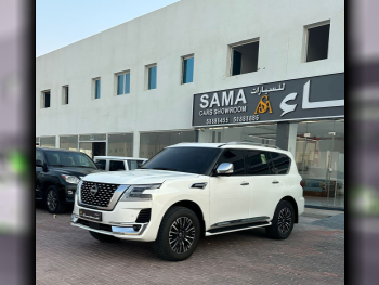 Nissan  Patrol  Platinum  2023  Automatic  7,000 Km  8 Cylinder  Four Wheel Drive (4WD)  SUV  White  With Warranty