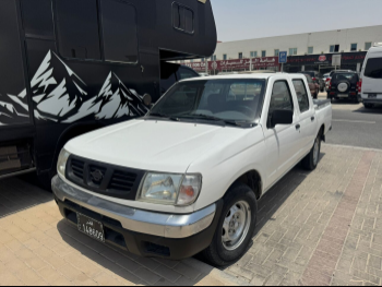 نيسان  بيك أب  2001  عادي  600,000 كم  4 سلندر  دفع خلفي  بيكب  أبيض