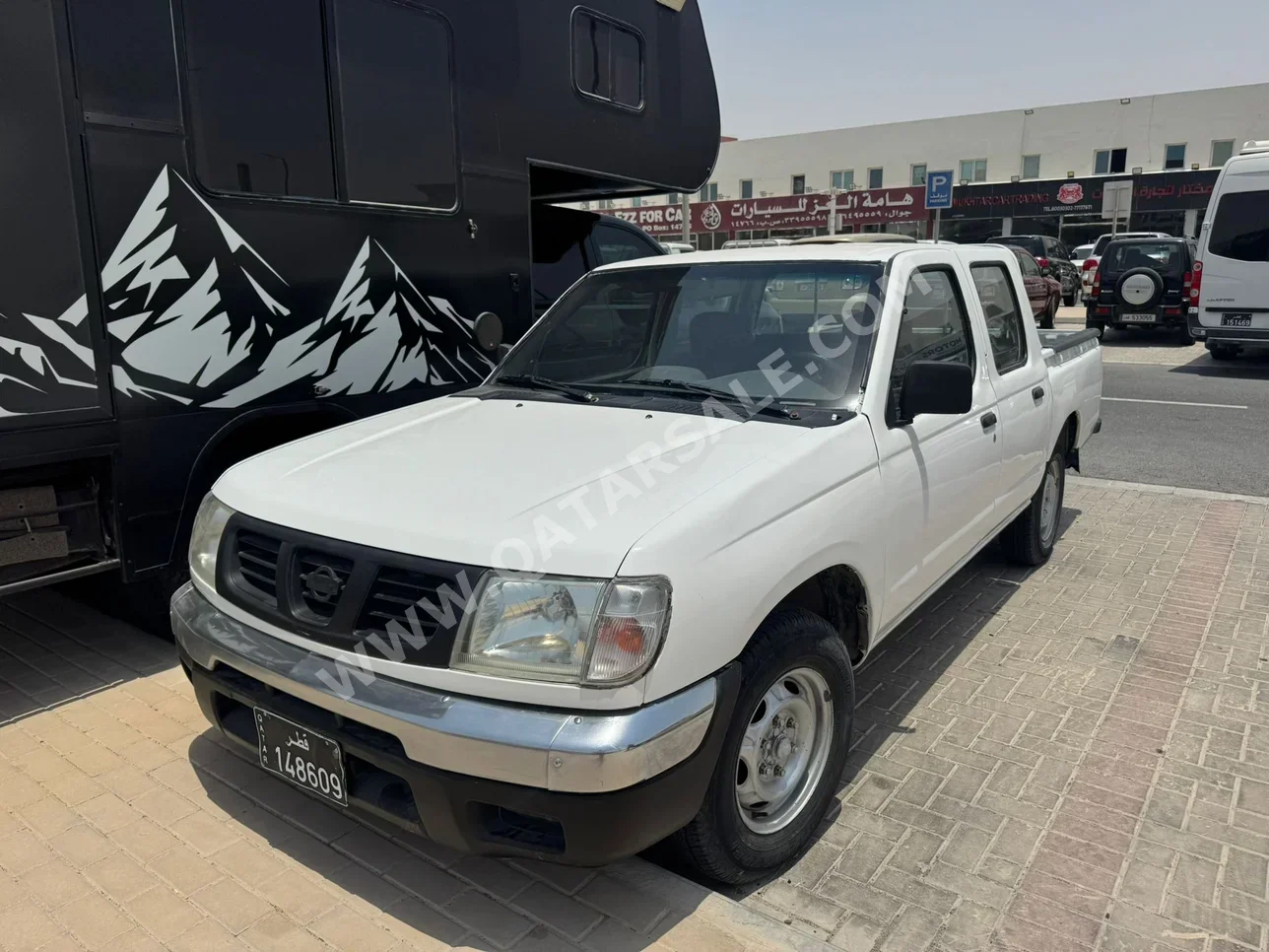 Nissan  Pickup  2001  Manual  600,000 Km  4 Cylinder  Rear Wheel Drive (RWD)  Pick Up  White