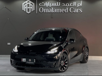 Tesla  Model Y  Performance  2023  Automatic  63,000 Km  0 Cylinder  All Wheel Drive (AWD)  SUV  Black  With Warranty