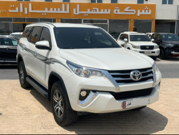 Toyota  Fortuner  2019  Automatic  207,000 Km  4 Cylinder  Four Wheel Drive (4WD)  SUV  White