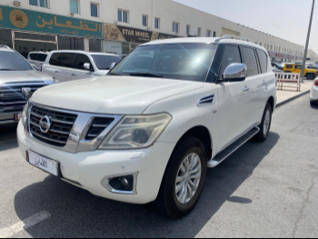 Nissan  Patrol  XE  2014  Automatic  269,000 Km  8 Cylinder  Four Wheel Drive (4WD)  SUV  White