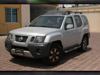 Nissan  Xterra  S  2013  Automatic  233,000 Km  6 Cylinder  Four Wheel Drive (4WD)  SUV  Silver
