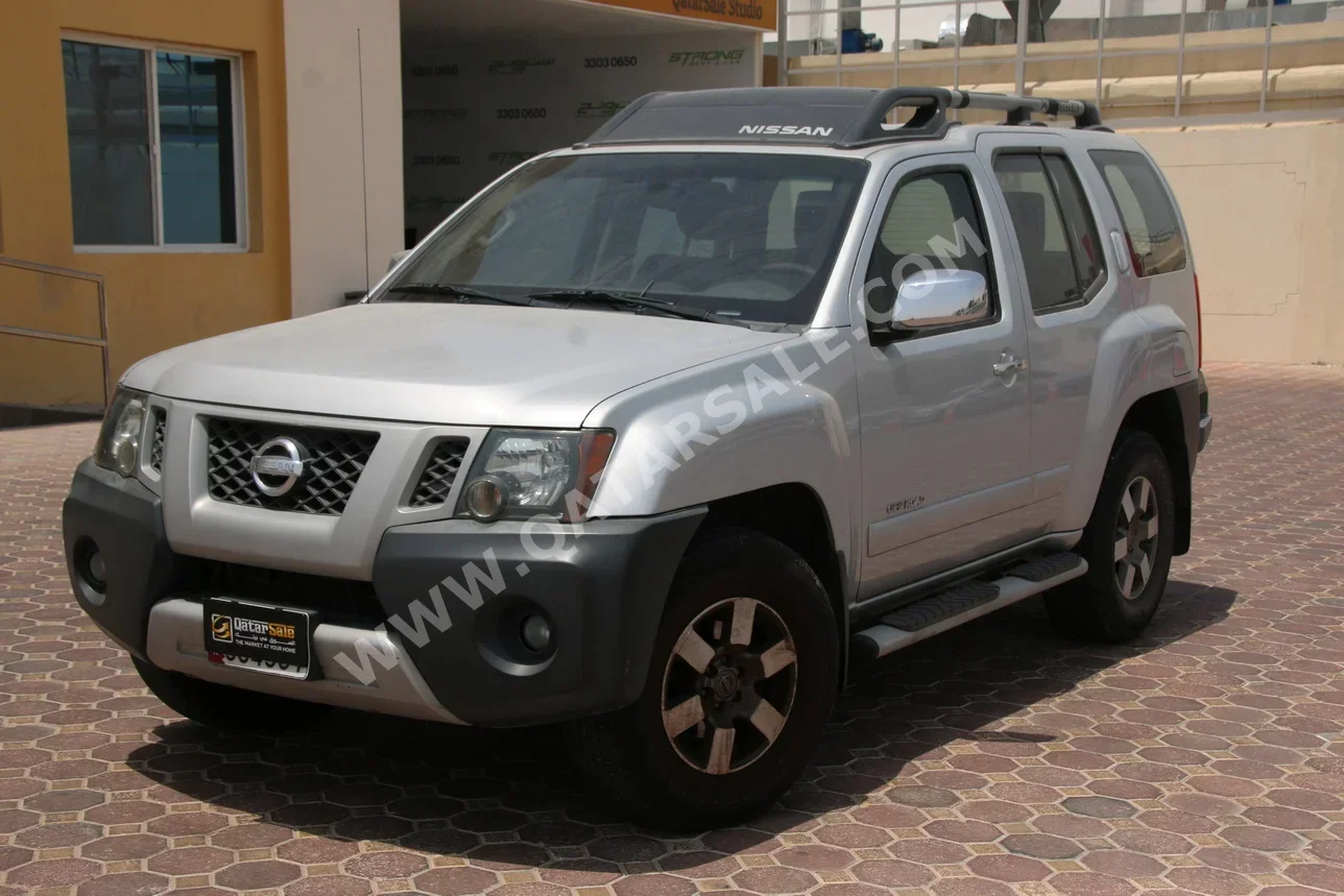 Nissan  Xterra  S  2013  Automatic  233,000 Km  6 Cylinder  Four Wheel Drive (4WD)  SUV  Silver