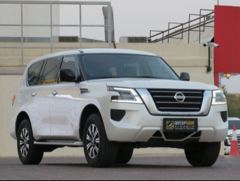 Nissan  Patrol  XE  2020  Automatic  125,000 Km  6 Cylinder  Four Wheel Drive (4WD)  SUV  White  With Warranty