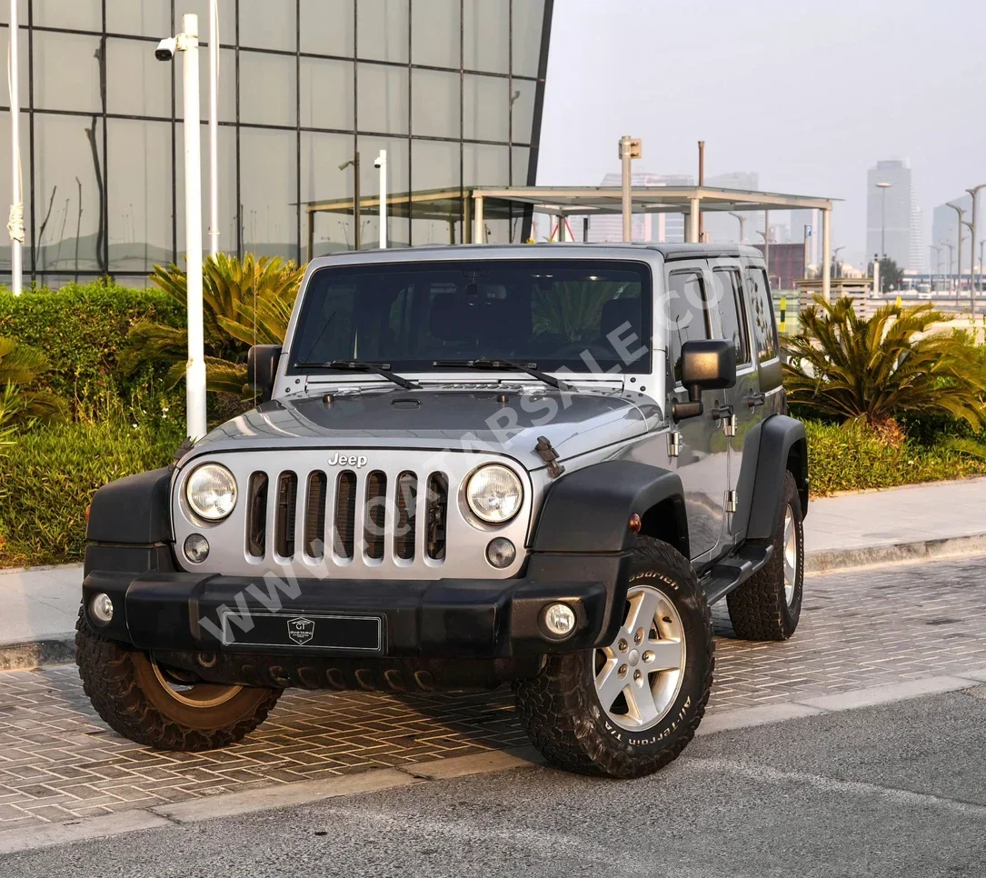 Jeep  Wrangler  Sahara  2015  Automatic  137,000 Km  6 Cylinder  Four Wheel Drive (4WD)  SUV  Gray