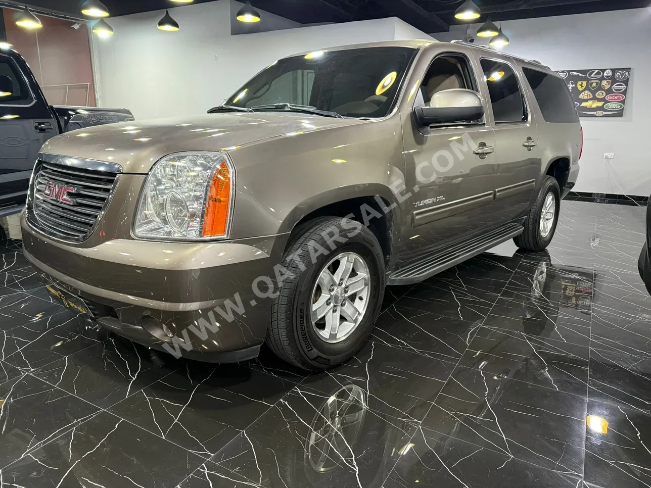 GMC  Yukon  2013  Automatic  116,000 Km  8 Cylinder  Four Wheel Drive (4WD)  SUV  Beige