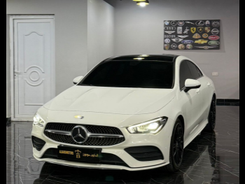 Mercedes-Benz  CLA  250  2023  Automatic  40,000 Km  4 Cylinder  Rear Wheel Drive (RWD)  Sedan  White  With Warranty