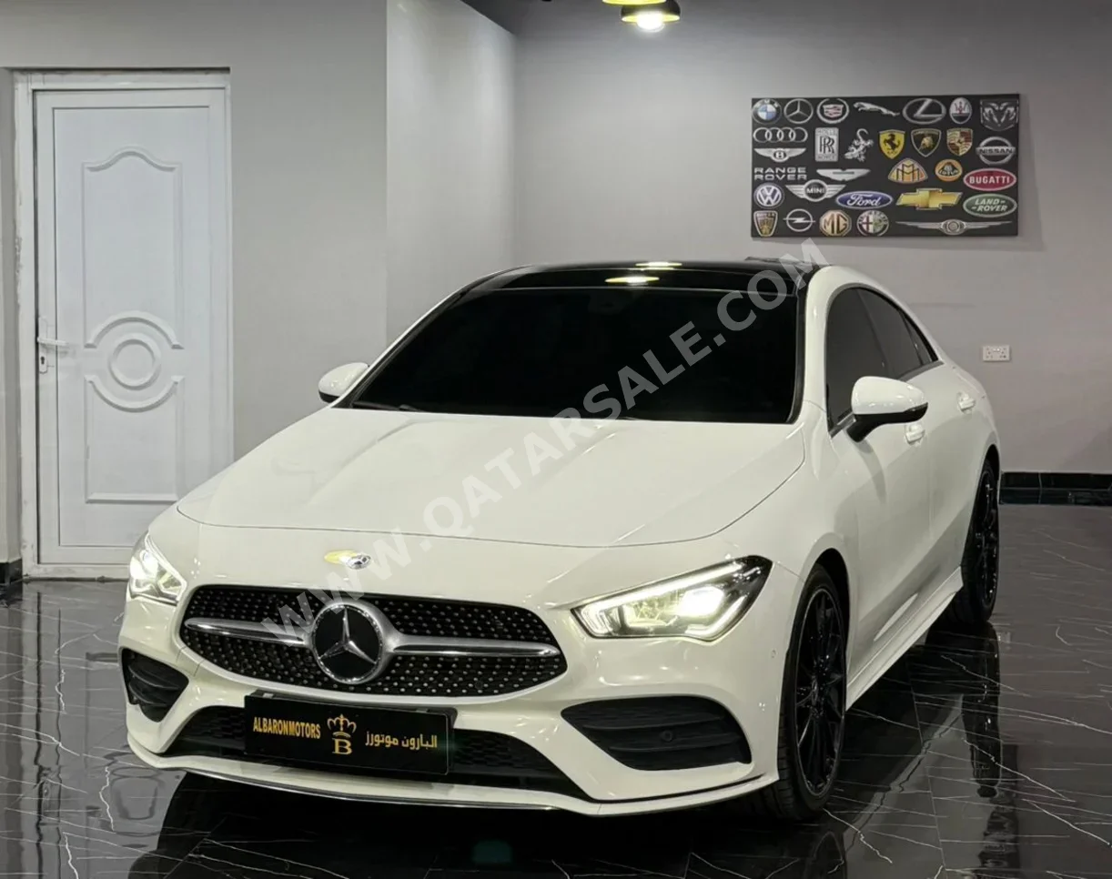 Mercedes-Benz  CLA  250  2023  Automatic  40,000 Km  4 Cylinder  Rear Wheel Drive (RWD)  Sedan  White  With Warranty