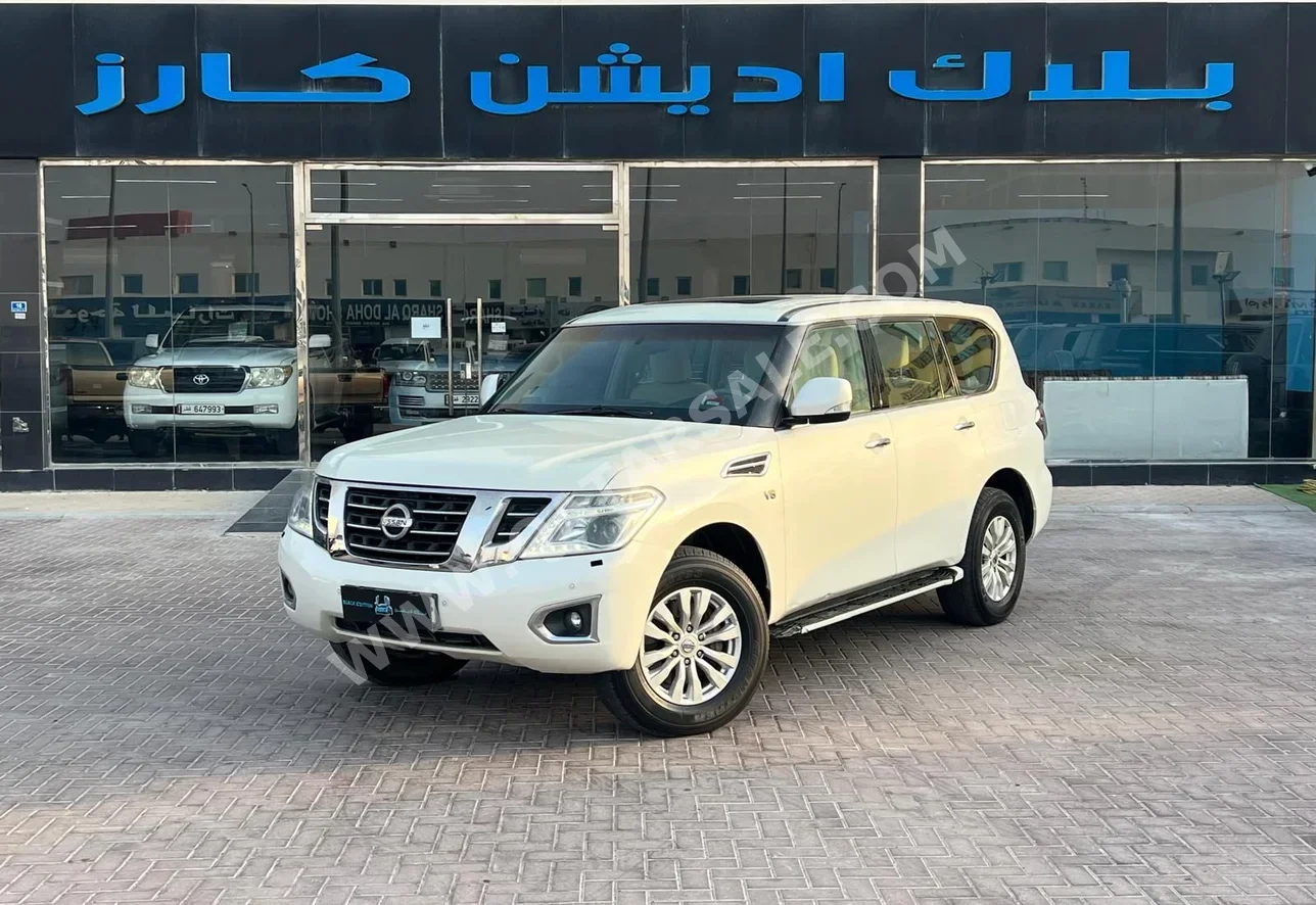 نيسان  باترول  اس اي  2015  اوتوماتيك  444,000 كم  8 سلندر  دفع رباعي  اس يو في  أبيض