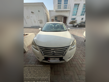 Nissan  Sentra  2016  Automatic  140,000 Km  4 Cylinder  Front Wheel Drive (FWD)  Sedan  White