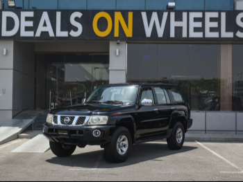 Nissan  Patrol  Safari  2006  Automatic  230,000 Km  6 Cylinder  Four Wheel Drive (4WD)  SUV  Black