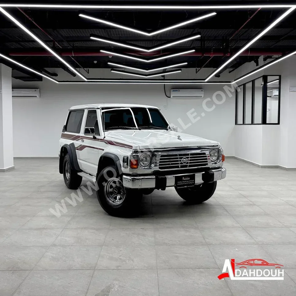 Nissan  Patrol  GL  1995  Manual  309,000 Km  6 Cylinder  Four Wheel Drive (4WD)  SUV  White