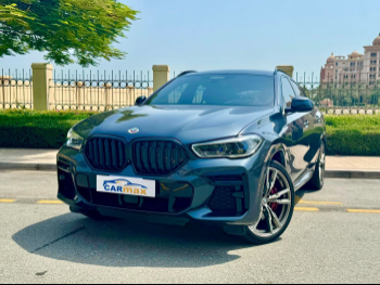 BMW  X-Series  X6 40i  2023  Automatic  29,000 Km  8 Cylinder  Four Wheel Drive (4WD)  SUV  Gray  With Warranty