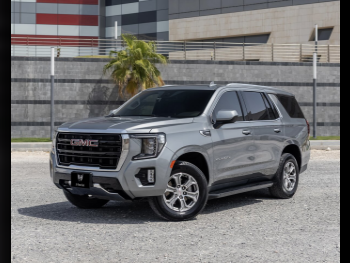 GMC  Yukon  SLE  2023  Automatic  100,000 Km  8 Cylinder  Rear Wheel Drive (RWD)  SUV  Silver  With Warranty