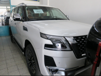 Nissan  Patrol  Platinum  2023  Automatic  0 Km  6 Cylinder  Four Wheel Drive (4WD)  SUV  White  With Warranty