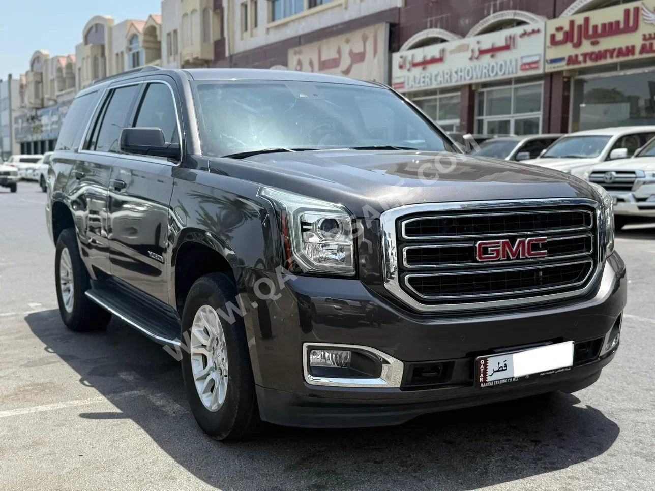 GMC  Yukon  SLE  2017  Automatic  148,000 Km  8 Cylinder  Four Wheel Drive (4WD)  SUV  Brown